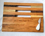 Slotted cutting/serving board